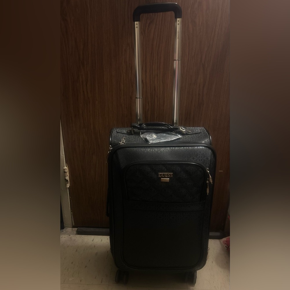 Used GUESS carry on bag